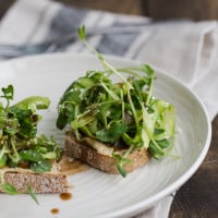 Asparagus and Pea Shoot Crostini with Hummus | @naturallyella