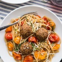 Lentil Meatballs with Burst Tomato Pasta | @naturallyella