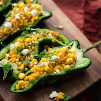 Sweet Corn Sorghum Stuffed Peppers | @naturallyella