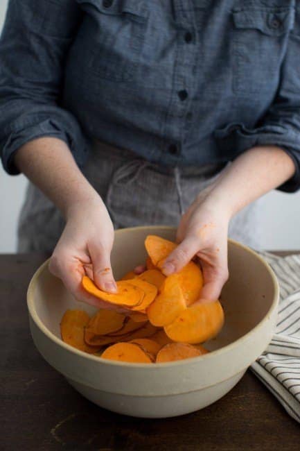 Tossing Sweet Potatoes with Sambal Oelek