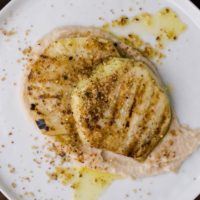 Grilled Celeriac with White Bean Puree and Breadcrumbs