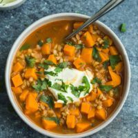 Sweet Potato Barley Stew with Sour Cream and Cilantro | @naturallyella