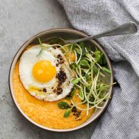 Sweet Potato Polenta with Fried Eggs ad Microgreens | Naturally Ella