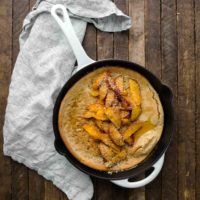 Multigrain Dutch Baby with Cinnamon Peaches | Naturally Ella