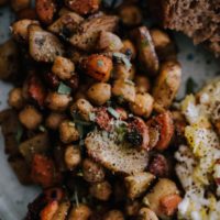 Close-up photograph of sunchoke hash with chickpeas and tarragon.