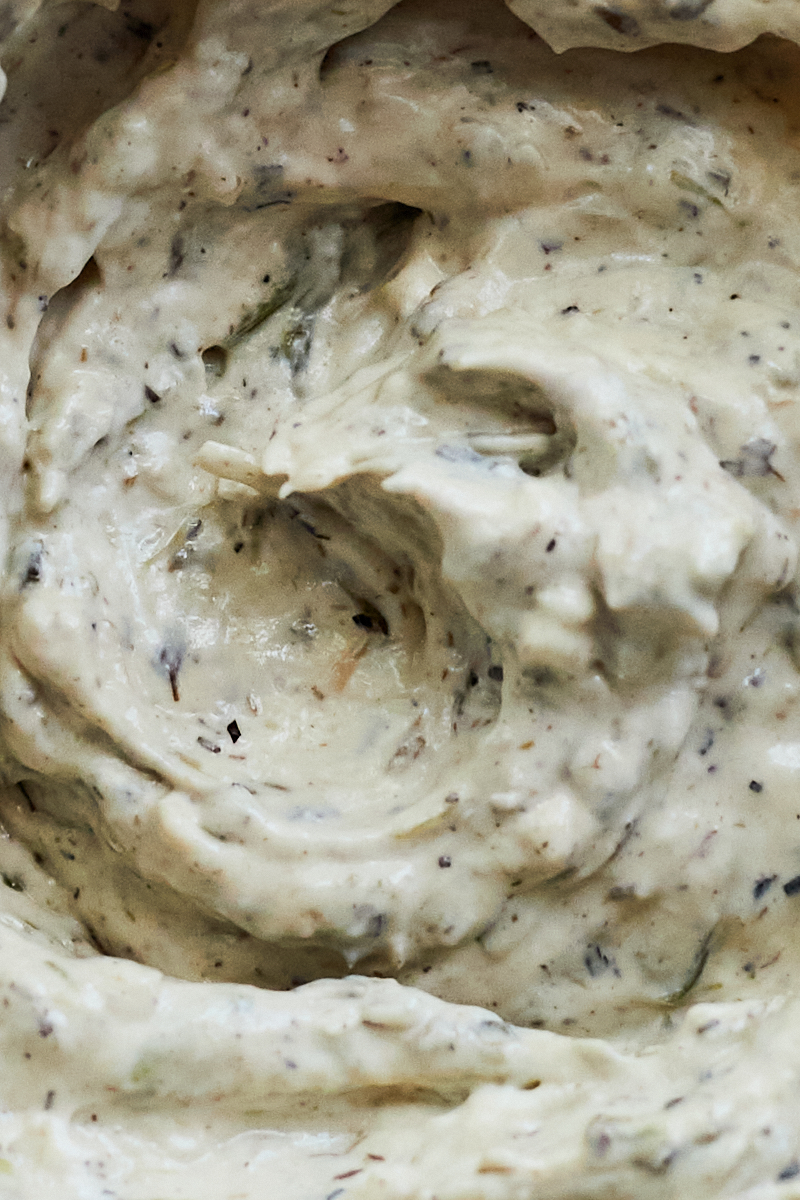 Close-up whipped scallion cream cheese.
